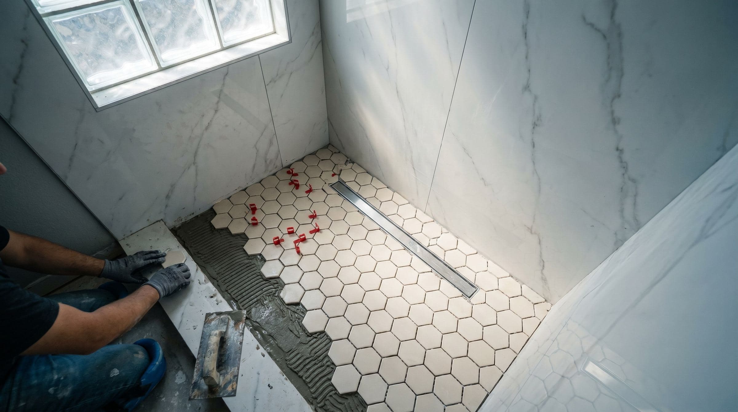 Shower Floor Tile Sizes for Jersey Shore Bathrooms: Why Bigger Is Usually Wrong — tile and stone guide by JL Tile & Stone, New Jersey