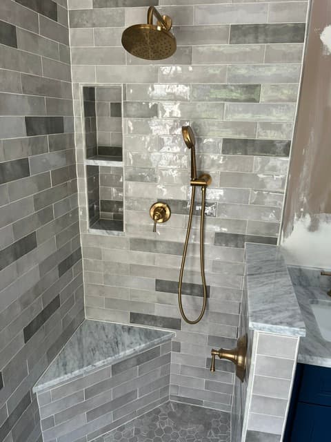 Brushed Gold & Marble Primary Bath — tile and stone work photo 3 by JL Tile & Stone, New Jersey