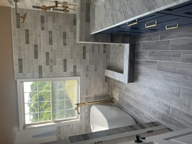 Brushed Gold & Marble Primary Bath — bathroom project in Morganville, NJ by JL Tile & Stone